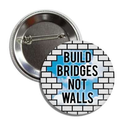 mlk jr quote build bridges not walls broken wall sky clouds button